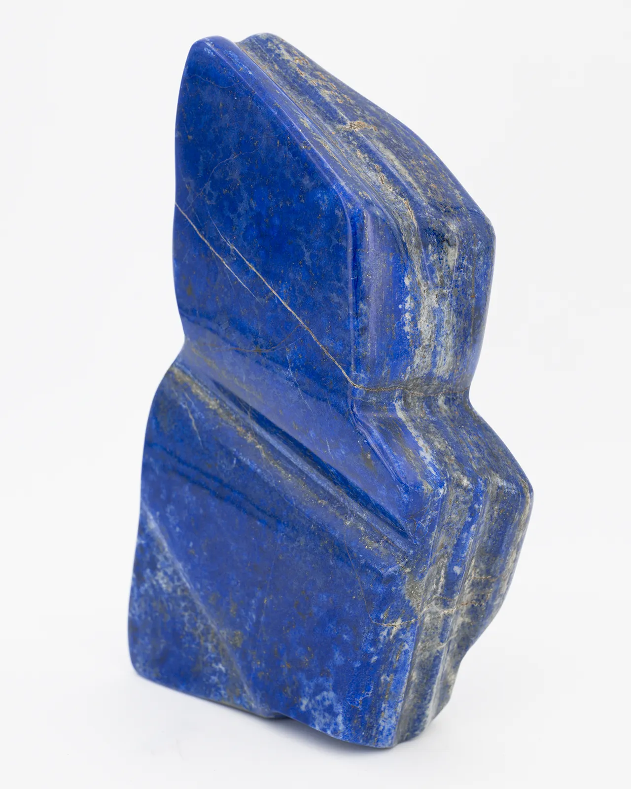 Lapis lazuli en forme libre de 2KG à poser sur un meuble dans un salon ou atelier d'artiste